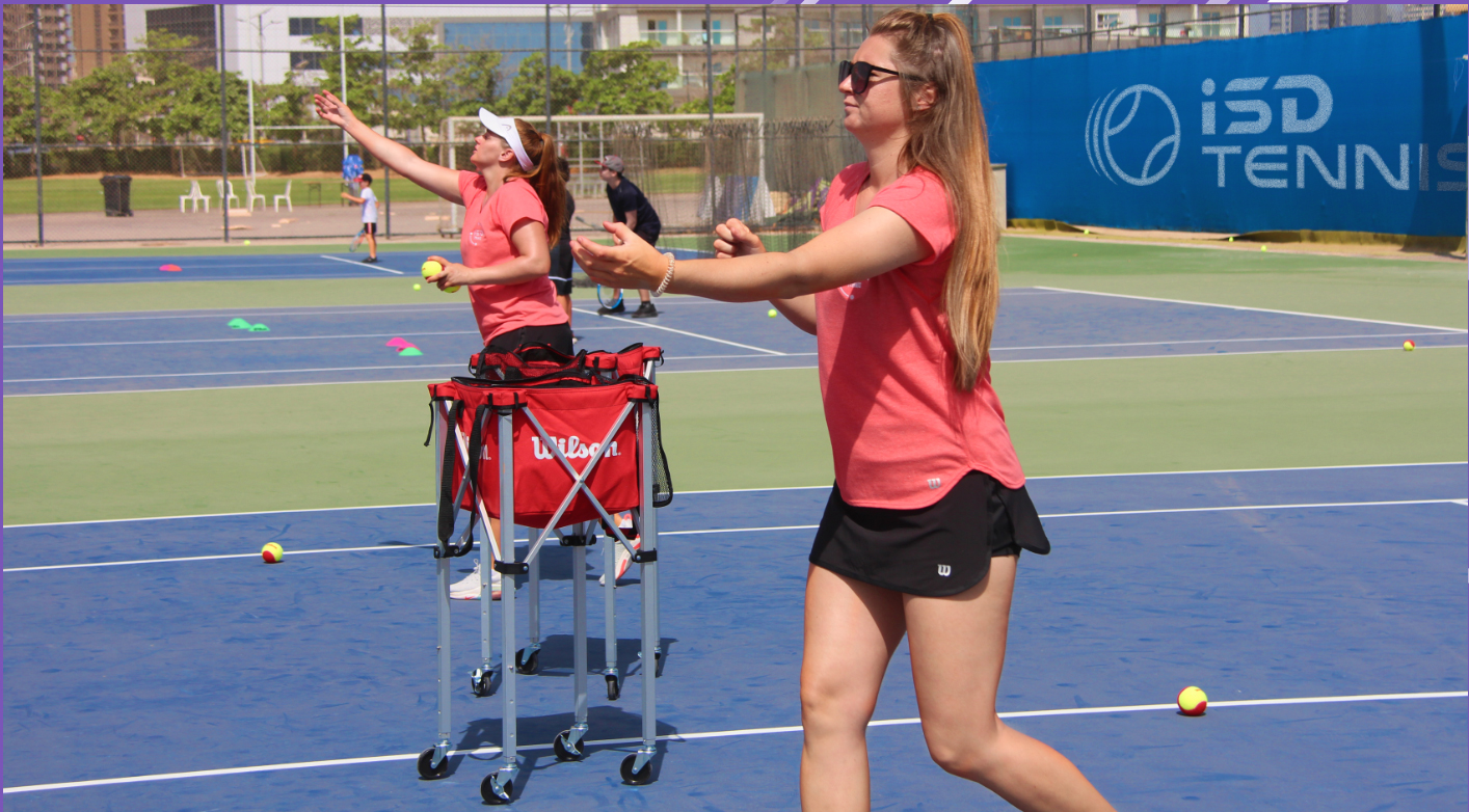 Tennis coach Alana Casey training students at ISD Tennis Academy Dubai
